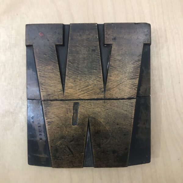 Broken wooden letter